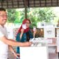 Bunda Indah bersama suaminya saat  di TPS 14