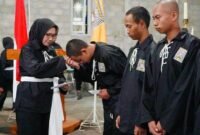 Bupati Lumajang saat mengikuti acara pengesahan anggota PSHT Lumajang