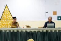 Kepala Dinas Kominfo Lumajang saat membuka  Bimtek 